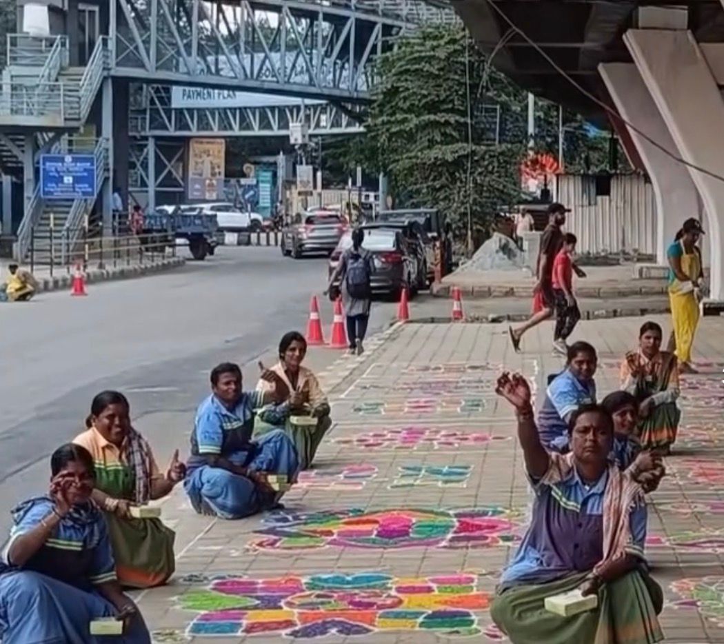 Volunteers and civic staff cleaned and beautified the area under the flyover on Sunday ending with a mass rangoli display. DH PHOTO