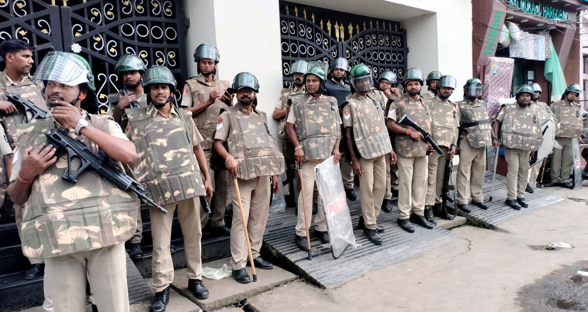 Security personnel stand guard in a sensitive area in view of Friday prayers, days after incidents of stone pelting and clashes, in Cuttack, Odisha.Credit: PTI