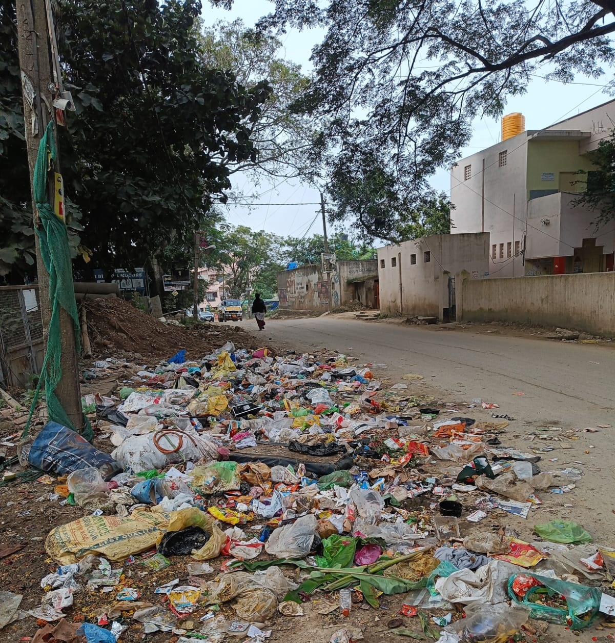 Garbage dumped near the Government High School Vajarahalli.