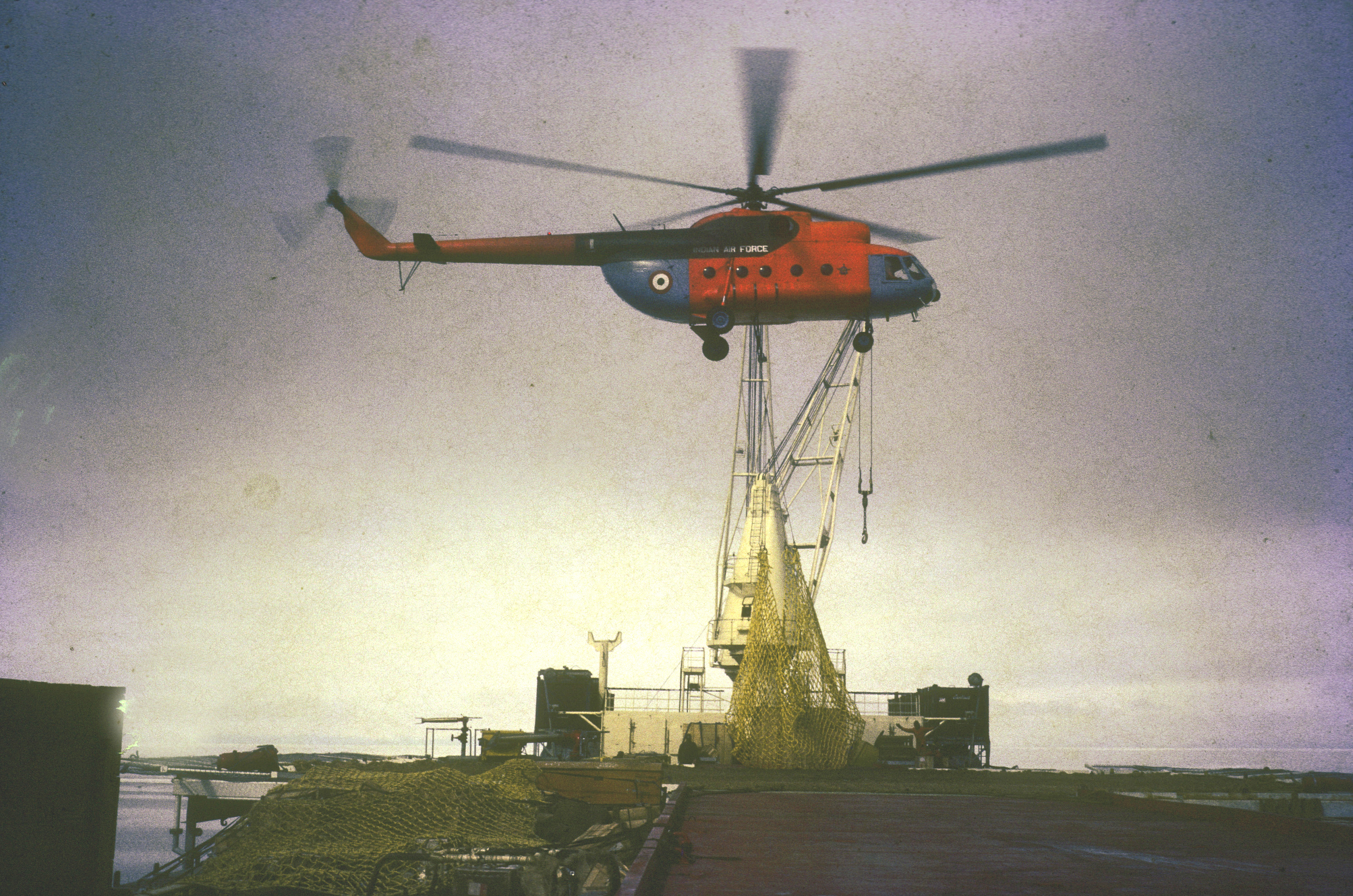 The Mi-8 helicopter with the underslung load, moments before crashing