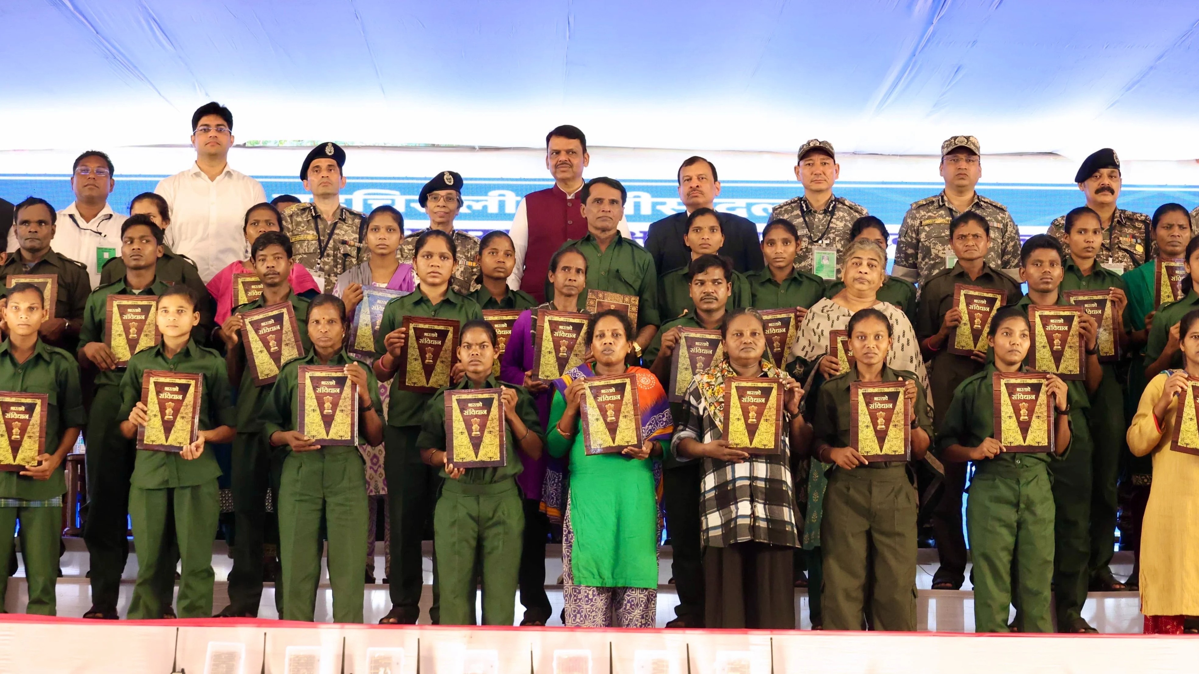 61 Naxals surrender in presence of CM Devendra Fadnavis in Maharashtra