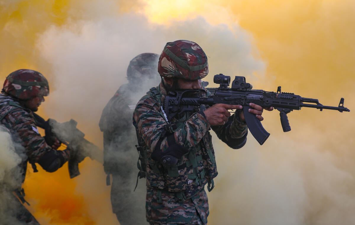 Army personnel during a mock drill ahead of the upcoming ‘Diwali’ festival, in Jammu district.