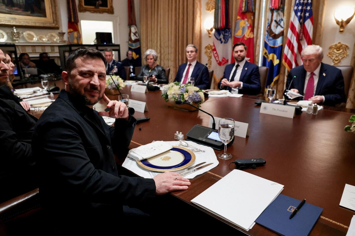 Ukraine's President Volodymyr Zelenskiy meets with U.S. President Donald Trump over lunch in the Cabinet Room at the White House in Washington, D.C..