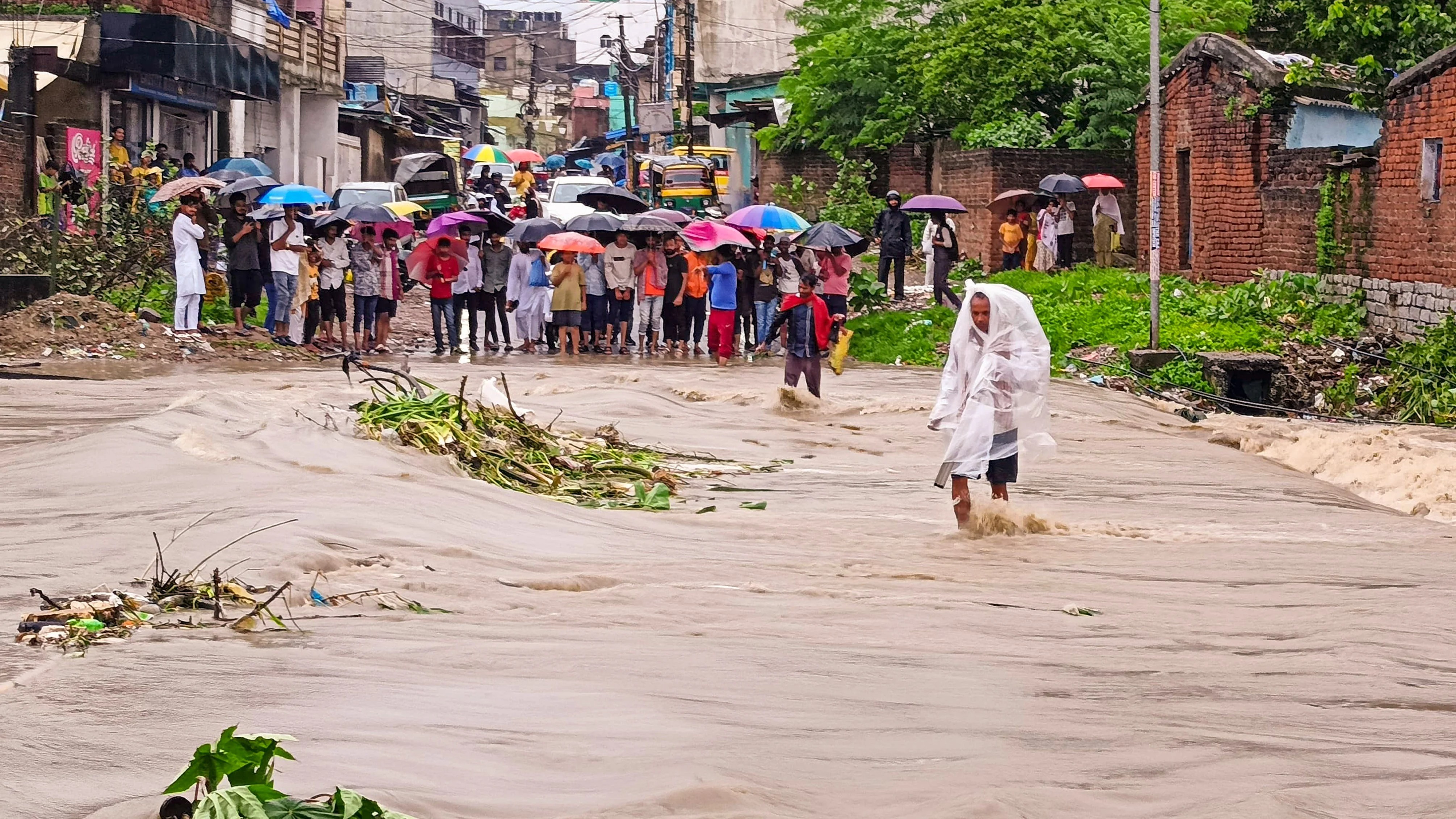 Heavy rains fail to deter people as they throng markets to make last minute purchases for Diwali