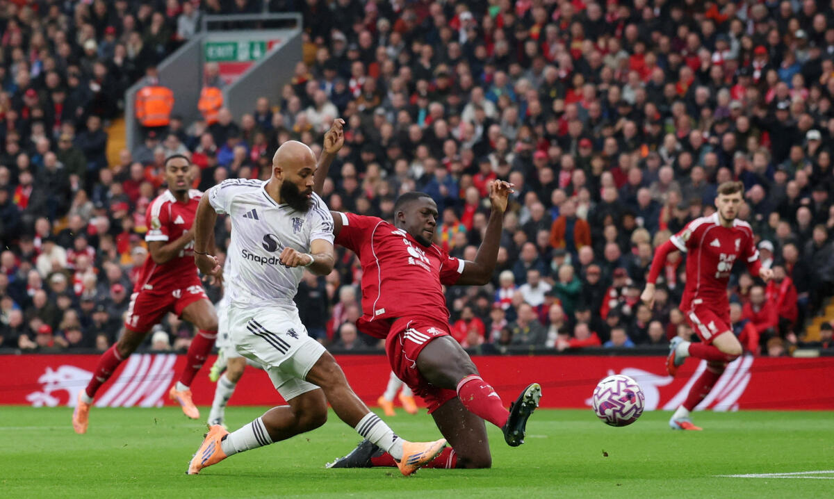 Manchester United's Bryan Mbeumo scores their first goal.