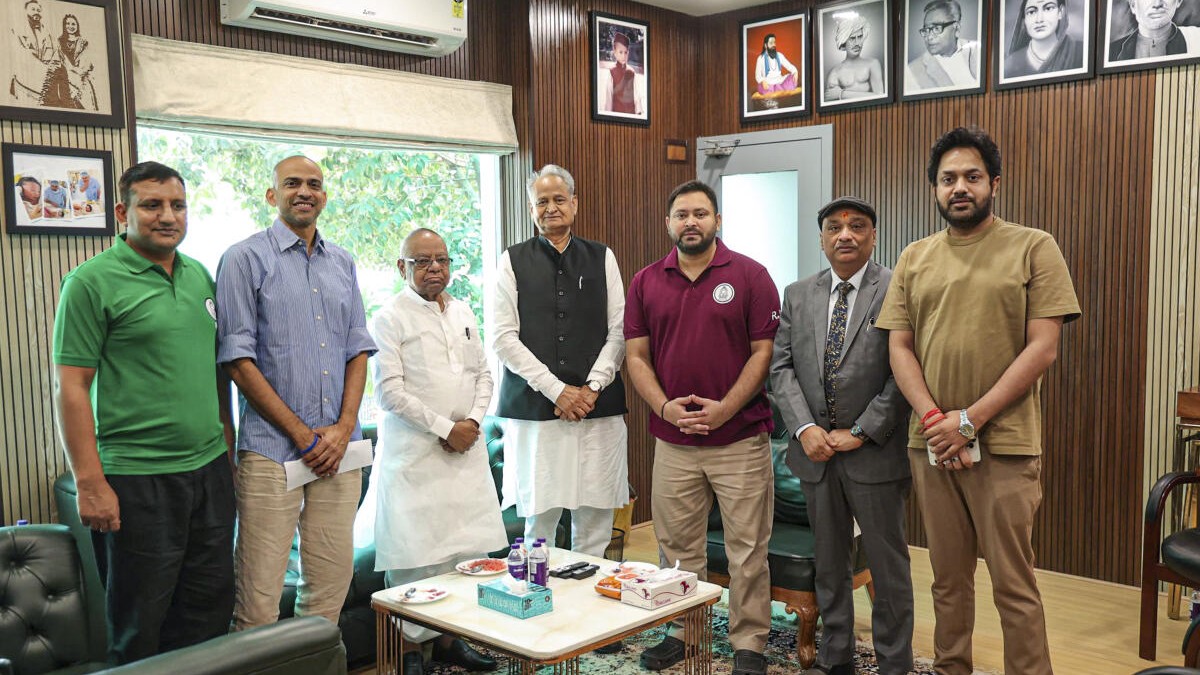 Congress leader Ashok Gehlot with AICC Bihar in-charge Krishna Allavaru, RJD leader Tejashwi Yadav and others during a meeting ahead of the state Assembly elections.