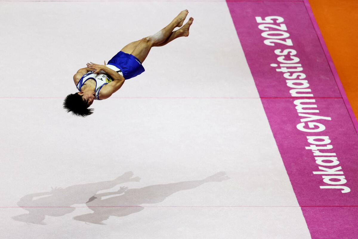 Japan's Kazuki Minami in action during his floor exercise.