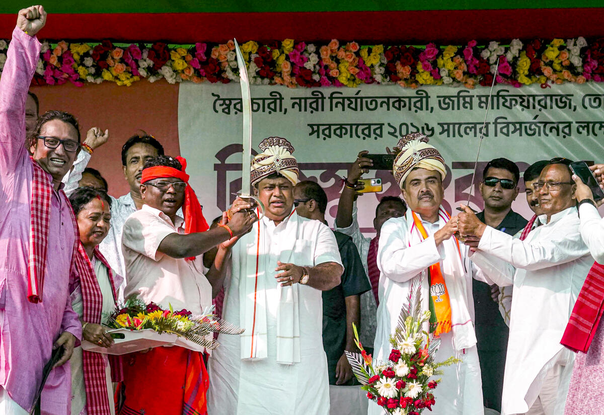 Union Minister of State for Development of North Eastern Region (DoNER) and Leader of Opposition in West Bengal Assembly Suvendu Adhikari with others during BJP’s 'Vijay Sankalp Sabha' at Gangarampur, in Dakshin Dinajpur district.