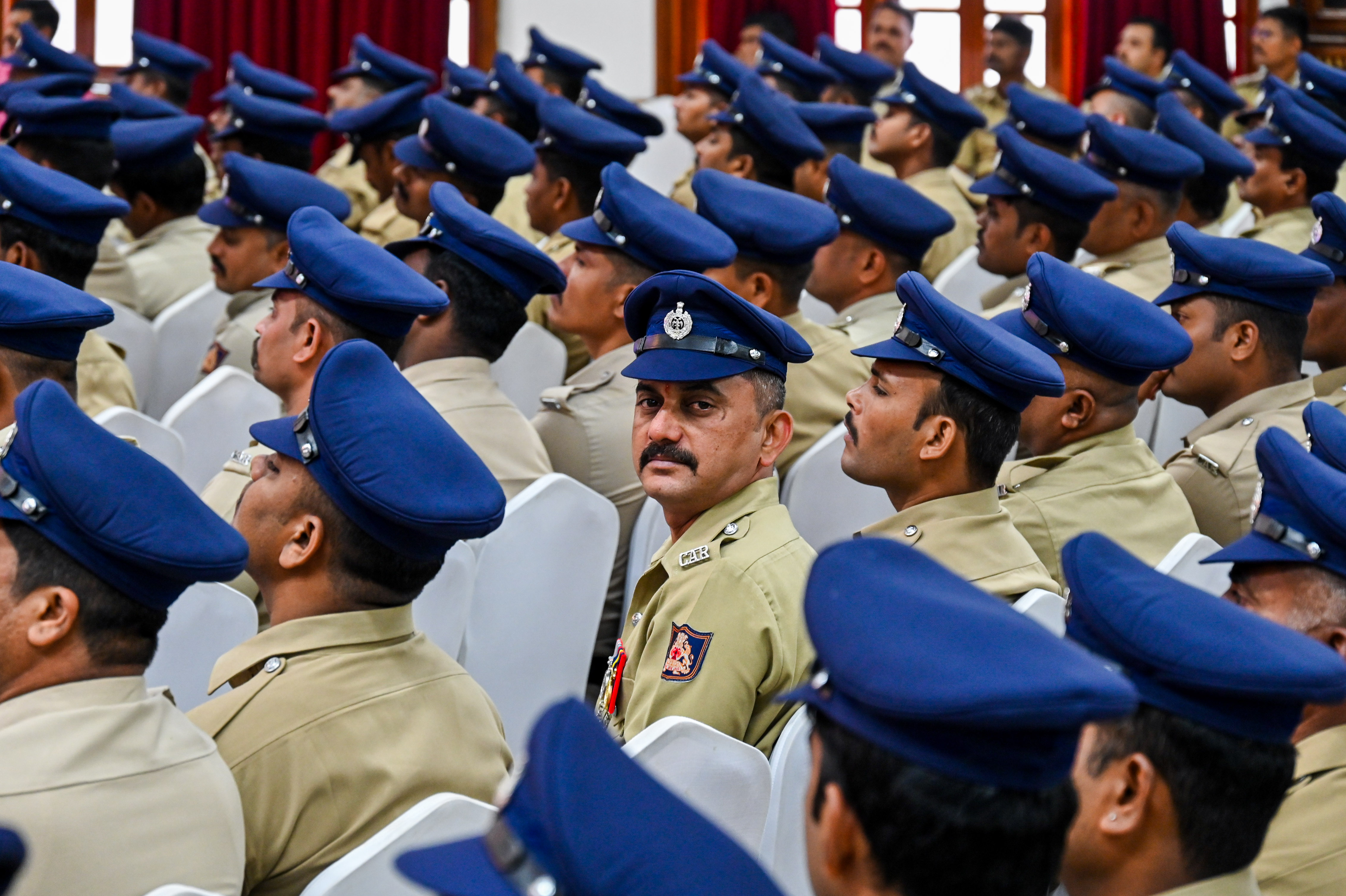 Peak caps give the personnel a refurbished look. 