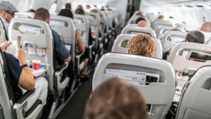 Indian national allegedly stabs 2 teens mid-flight; charged with assault