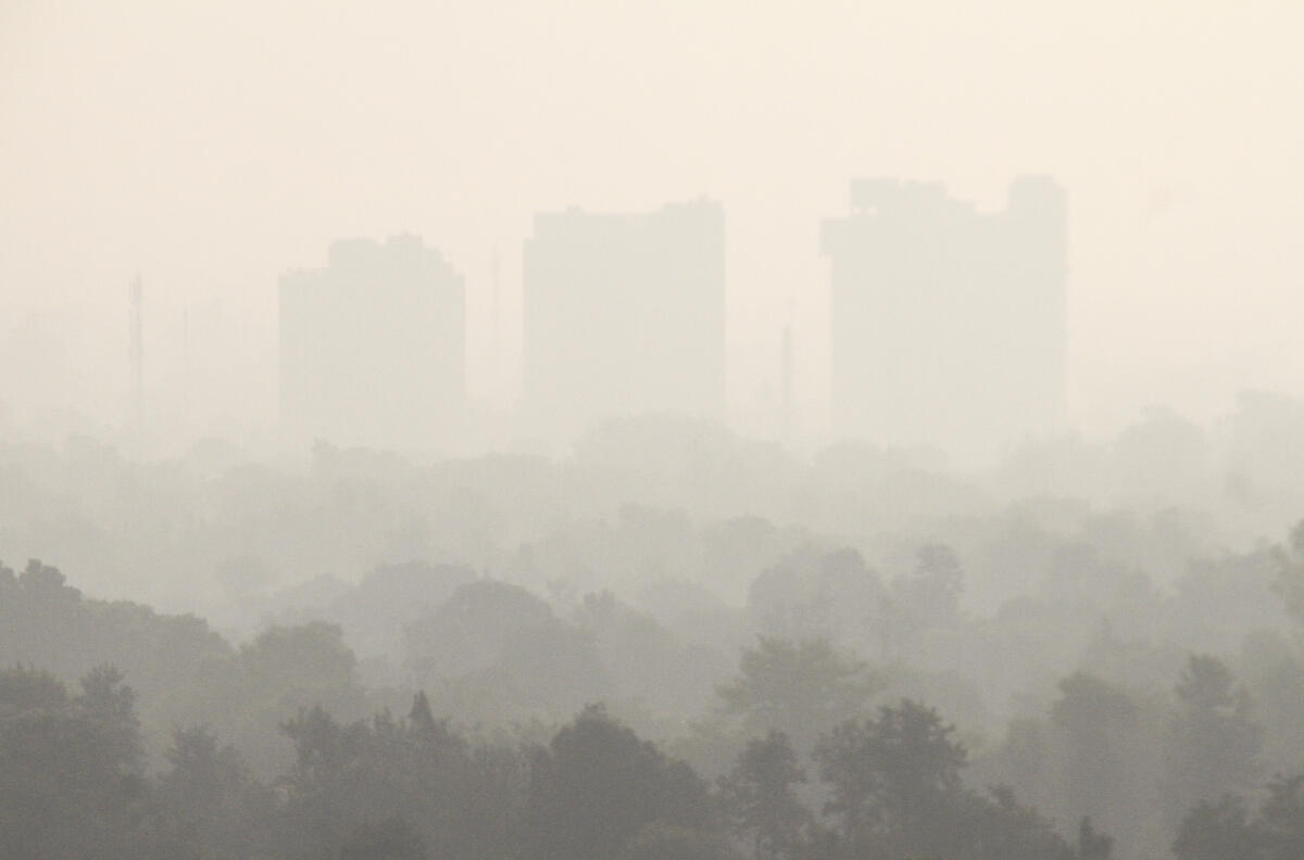 High-rise building amid low visibility as air quality deteriorates across Northern India, in Gurugram, Haryana
