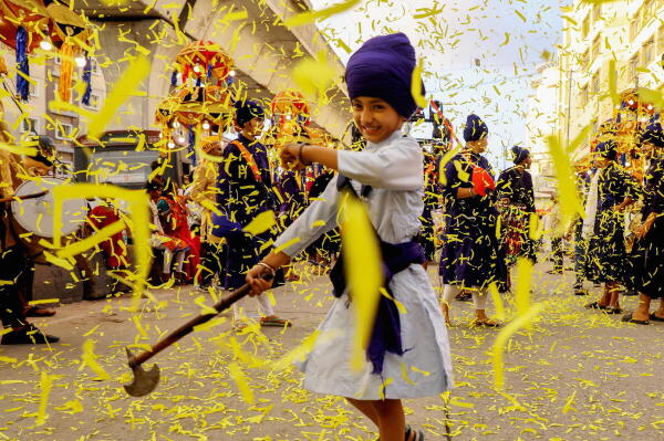 A child takes part in a ‘nagar kirtan’ procession ahead of ‘Gurpurab’, 556th birth anniversary of Sikh Guru Nanak Dev, in Hyderabad, Telangana.