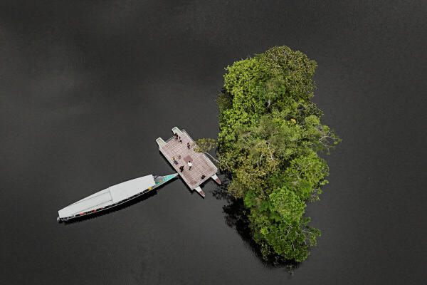 A drone view shows Lake Jatuncocha during the Yaku Mama (Water Mother) flotilla, a 3,000-km journey through the Amazon basin to the COP30 climate summit in Belem, Brazil to demand a role in global climate decision-making, in Yasuni National Park, Ecuador.