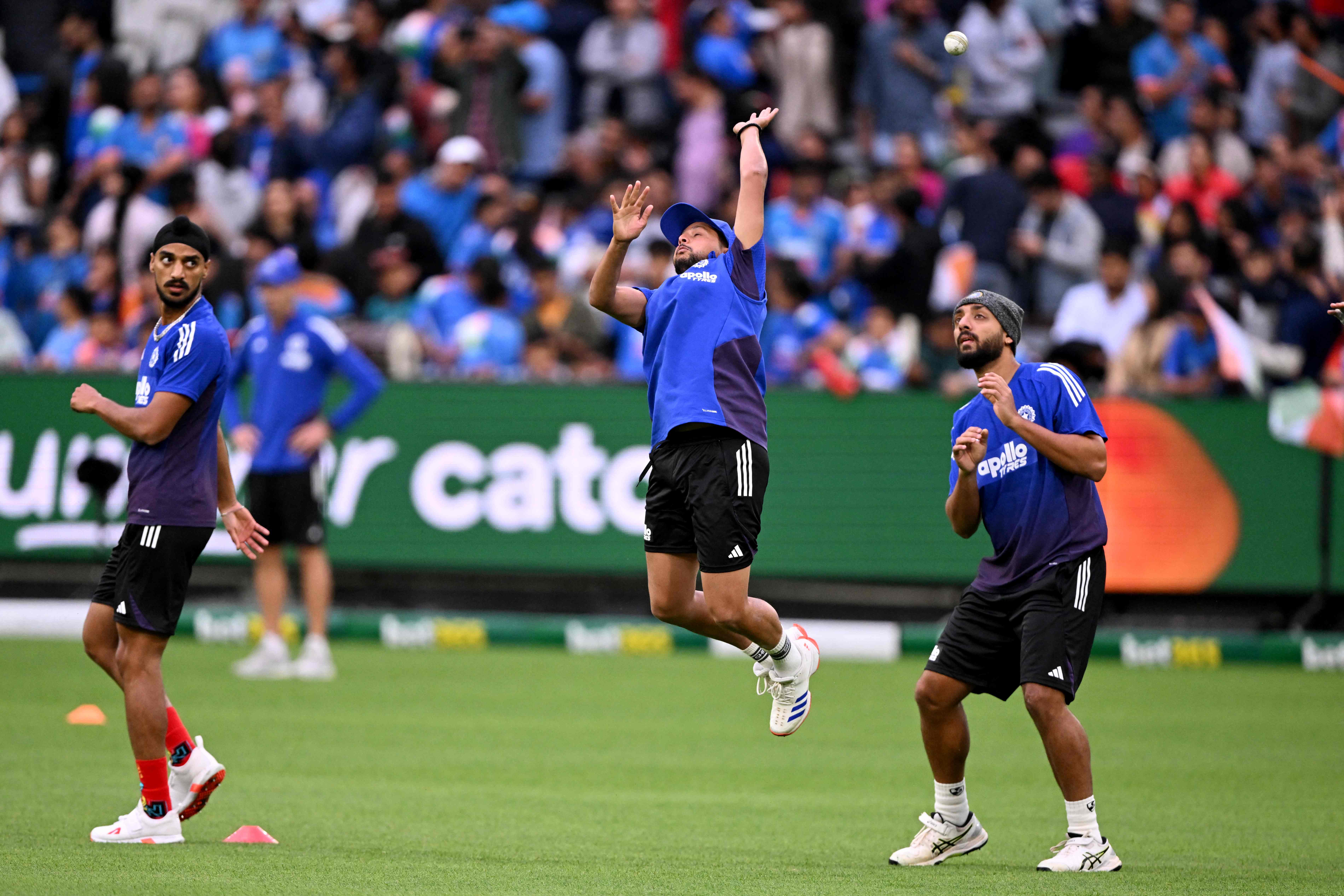 Indian players being put through session of catching. AFP 