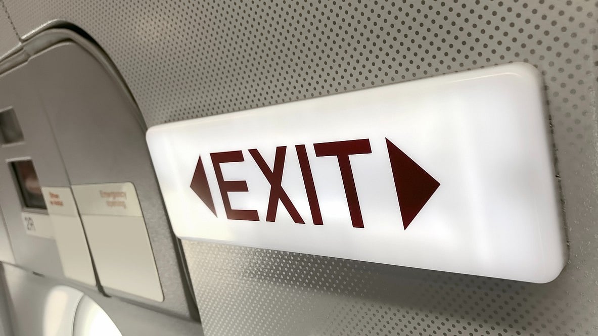 Passenger detained for trying to open emergency exit on flight at Varanasi ...