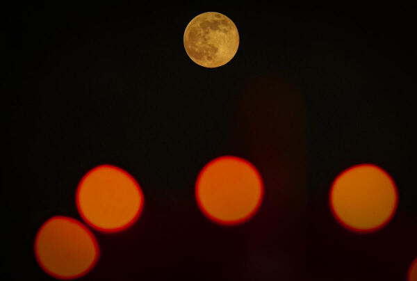 A full moon rises on 'Kartik Purnima', in Kolkata, West Bengal.