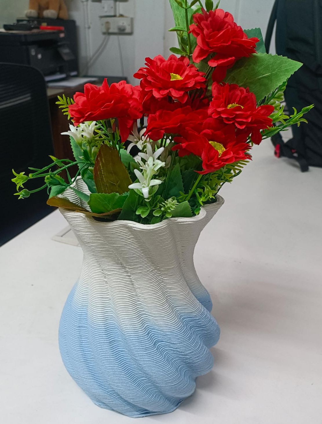 Discarded fishing nets find new life as flower vases.