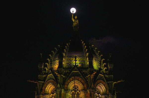 This month's full moon, also known as the Beaver Moon seen over the Chatrapati Shivaji Maharaj Terminus in Mumbai.