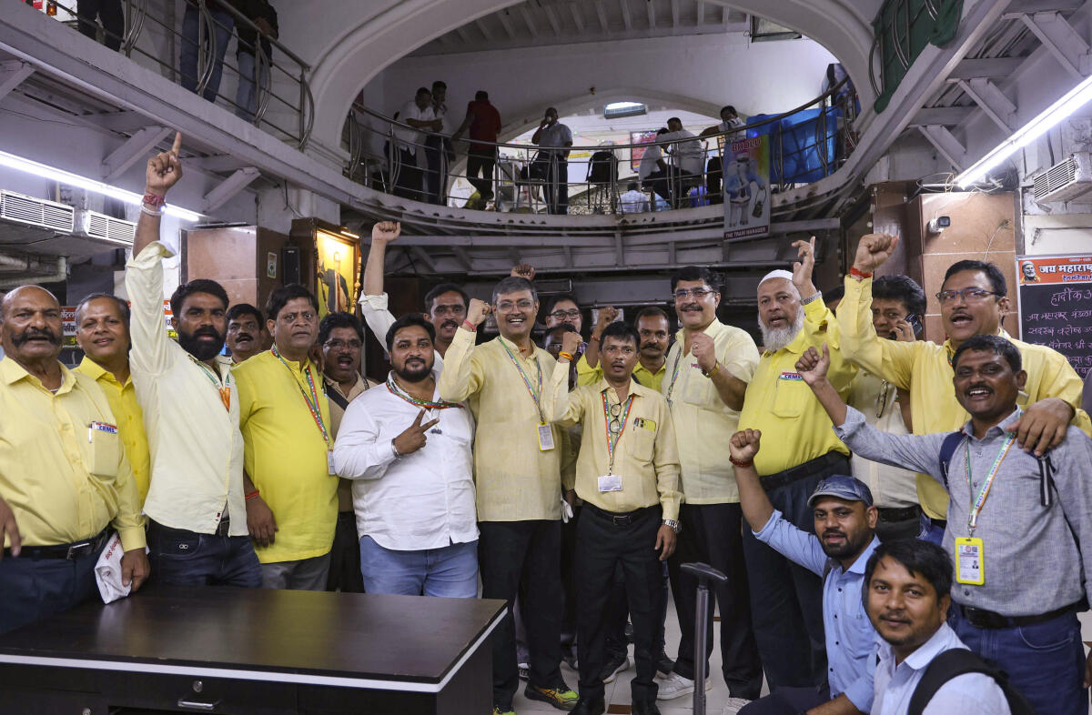 Railway union officials protest at Chhatrapati Shivaji Maharaj Terminus (CSMT), halting local trains during peak hours to oppose the FIR filed against engineers in connection with an accident case, in Mumbai.Credit: PTI
