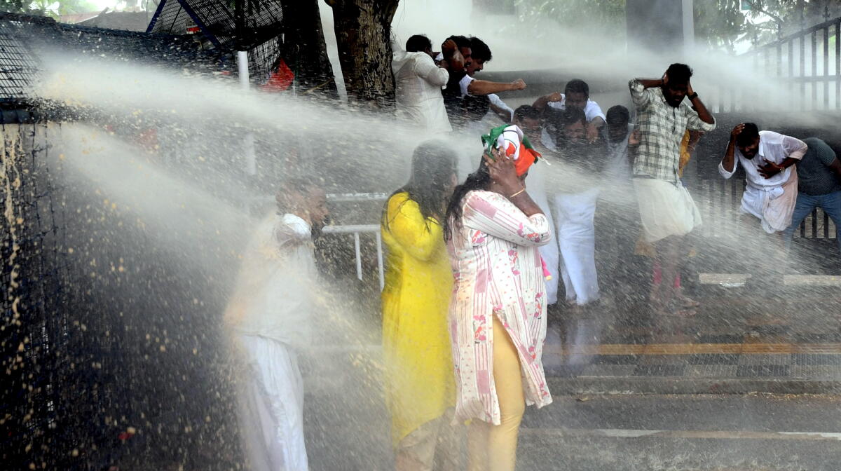 Police personnel use water cannons to disperse Congress workers during their protest march to Kerala Health Minister Veena George's residence over the death of a cardiac patient, who allegedly did not receive proper treatment at the state-run Government Medical College Hospital, in Thiruvananthapuram. Credit: PTI