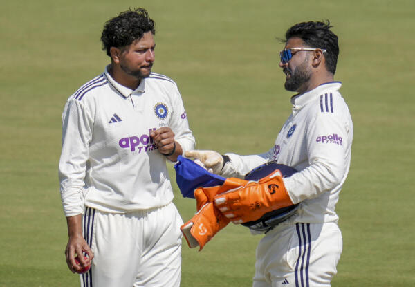 India A's captain Rishabh Pant, right, interacts with Kuldeep Yadav on day four of the second unofficial four-day Test cricket match of a series between India A and South Africa A, at BCCI Centre of Excellence, in Bengaluru. Credit: PTI