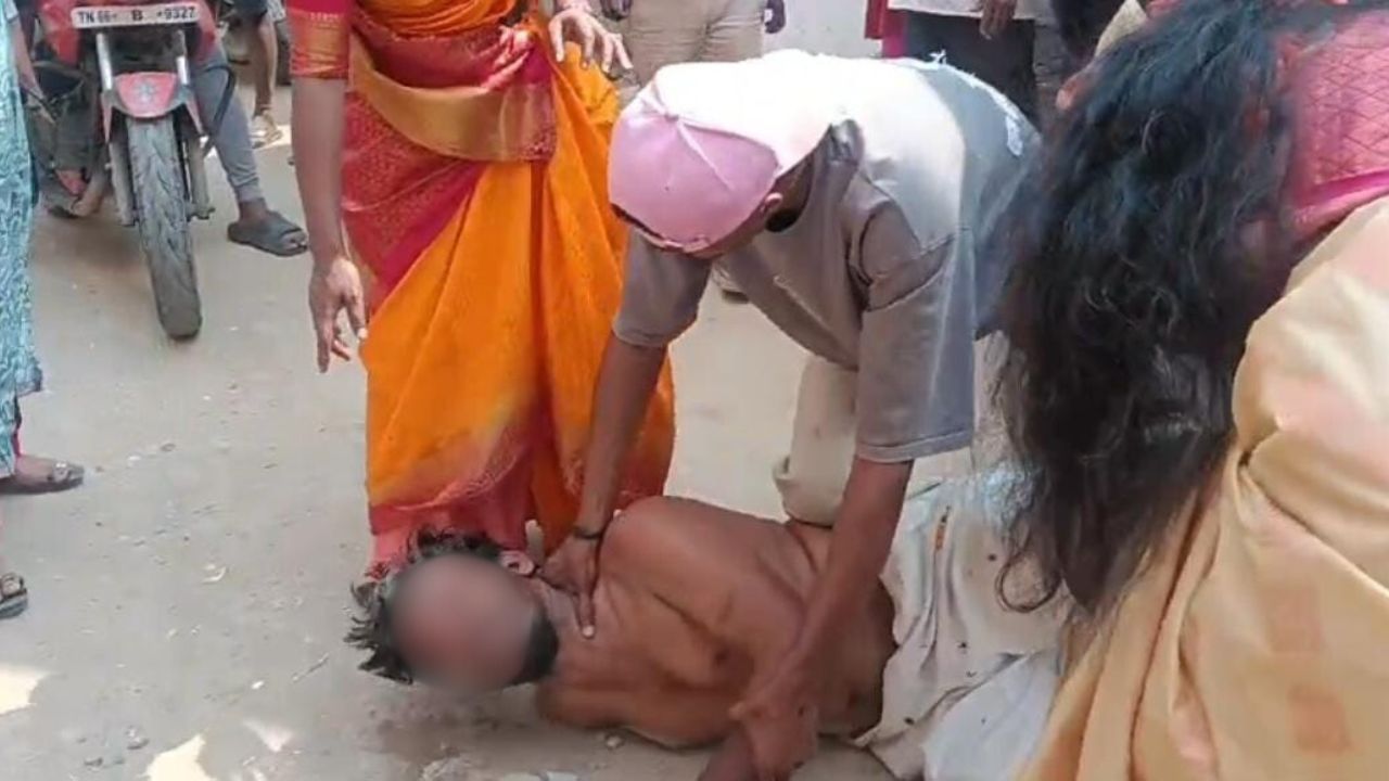 The suspect restrained by the public.