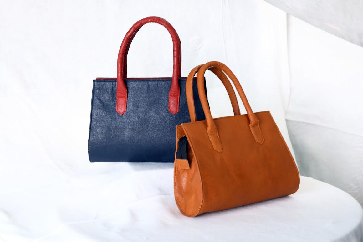 Vegan leather handbags made of leaf sheaths of areca palms.