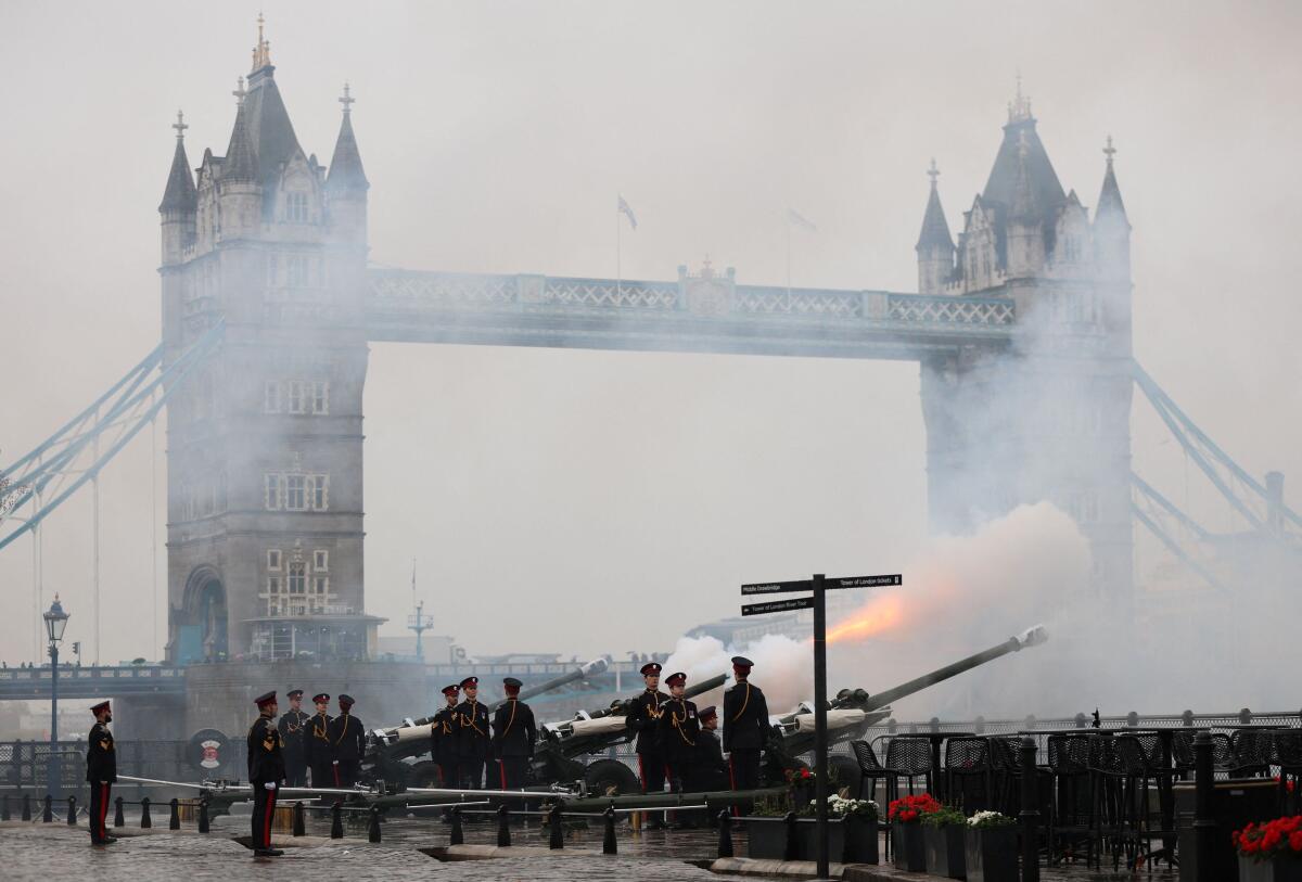 A gun is fired by the Honourable Artillery Company during a 62-gun salute marking the 77th birthday of Britain’s King Charles, in Tower Wharf, London, Britain.