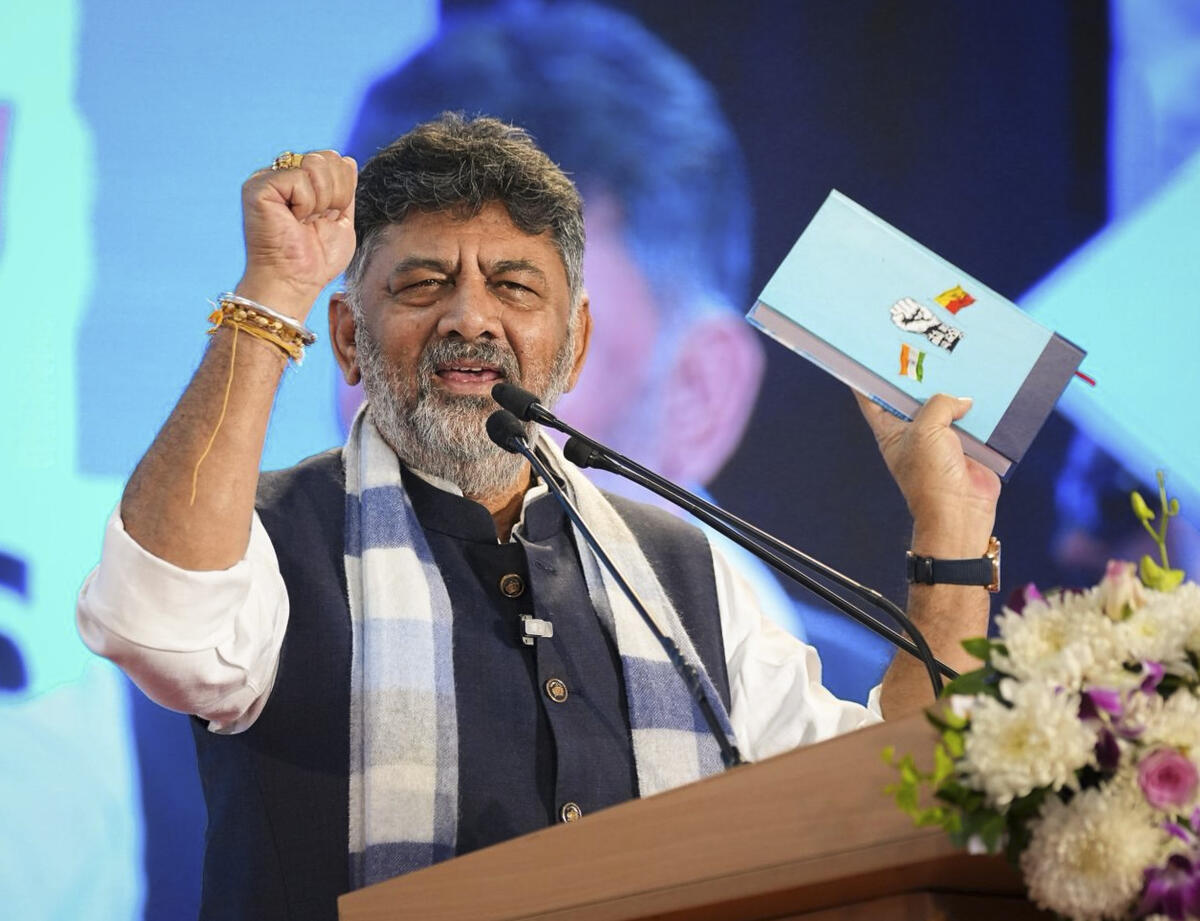 Karnataka Deputy Chief Minister and Water Resource Minister DK Shivakumar addresses the gathering during the release of his book titled 'Neerina Hejje' (Foot Prints of Water), at Vidhana Soudha, in Bengaluru.