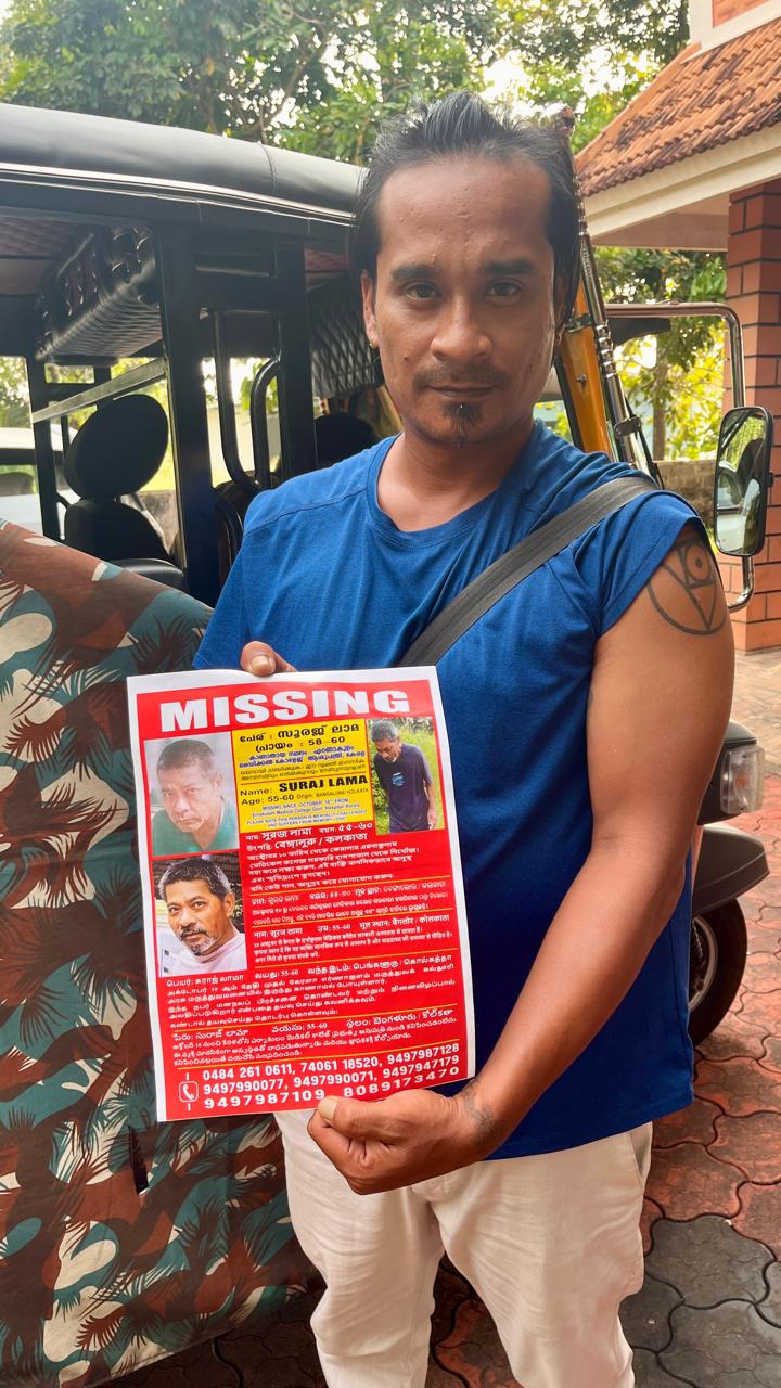 Santon Lama with his father's missing poster in Kochi. Pic by arrangement