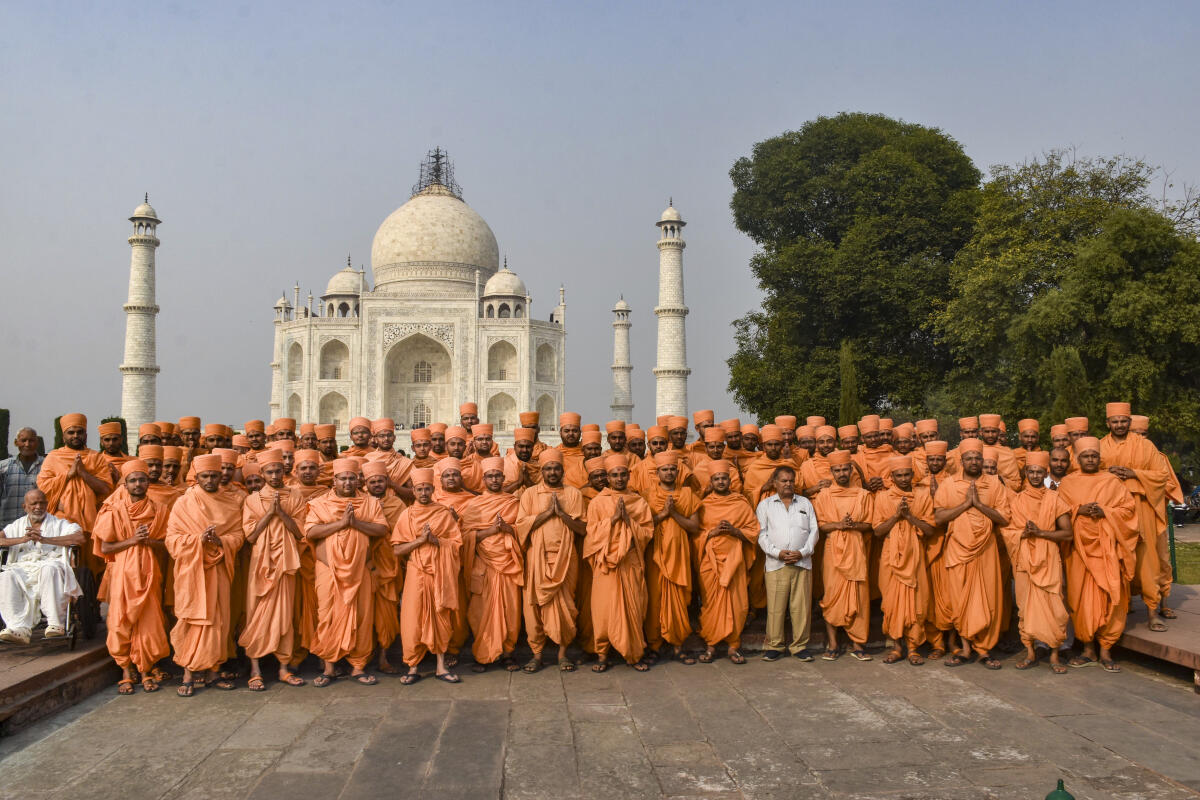 A group of saints from Akshardham temple visit Taj Mahal, in Agra.