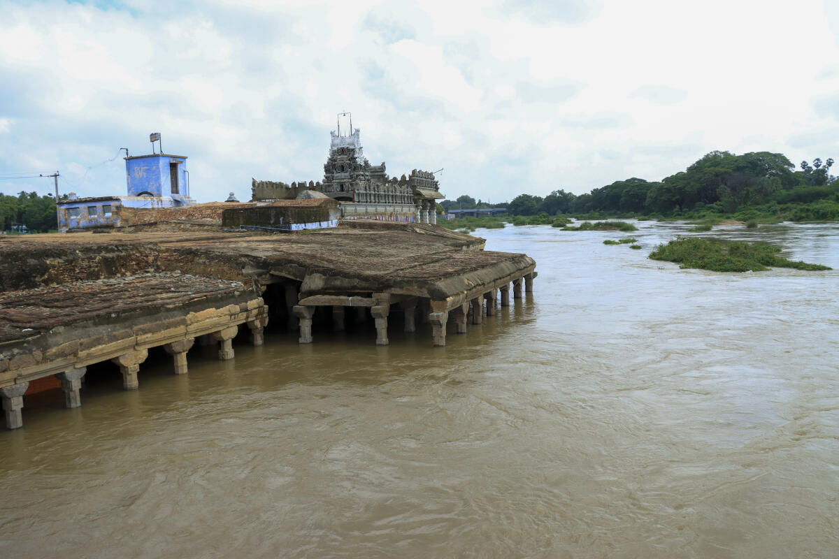 Kurukkuthurai Murugan Temple submerged in floodwater following heavy rainfall, in Tirunelveli, in Tamil Nadu.