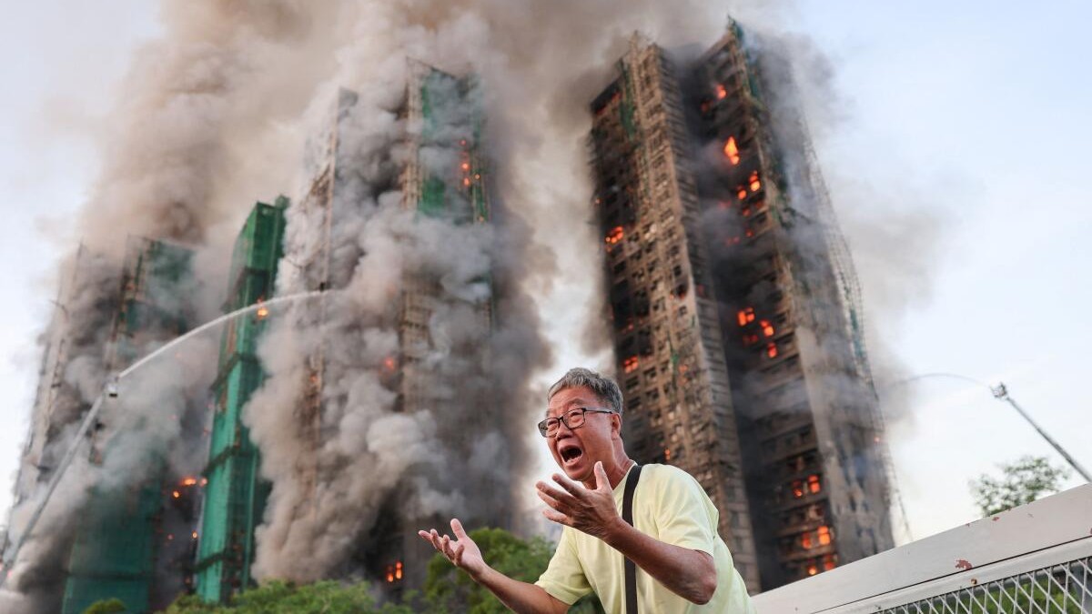 Four dead after fire engulfs residential high-rise buildings in Hong Kong