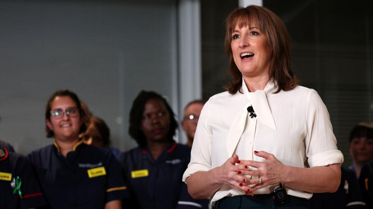 Britain raises taxes by more than $30 billion in tougher economic outlook