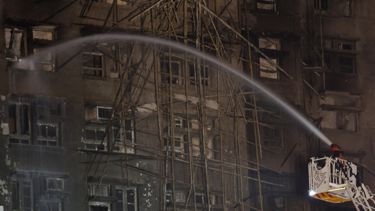 Hong Kong’s worst fire in generations that killed scores fuels scrutiny of safety lapses