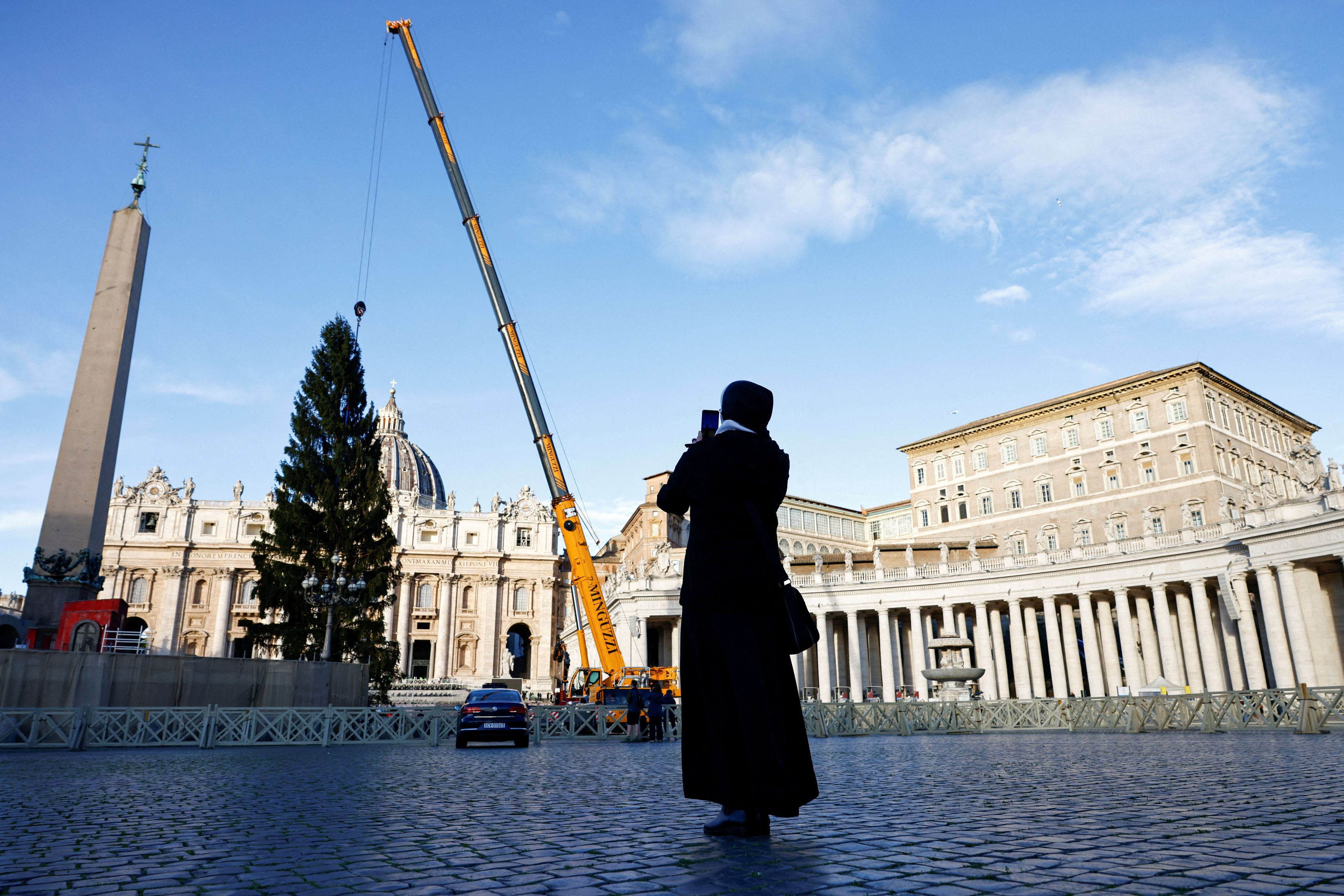 A Christmas tree arrives in St. Peter's Square ahead of the festive season at the Vatican.