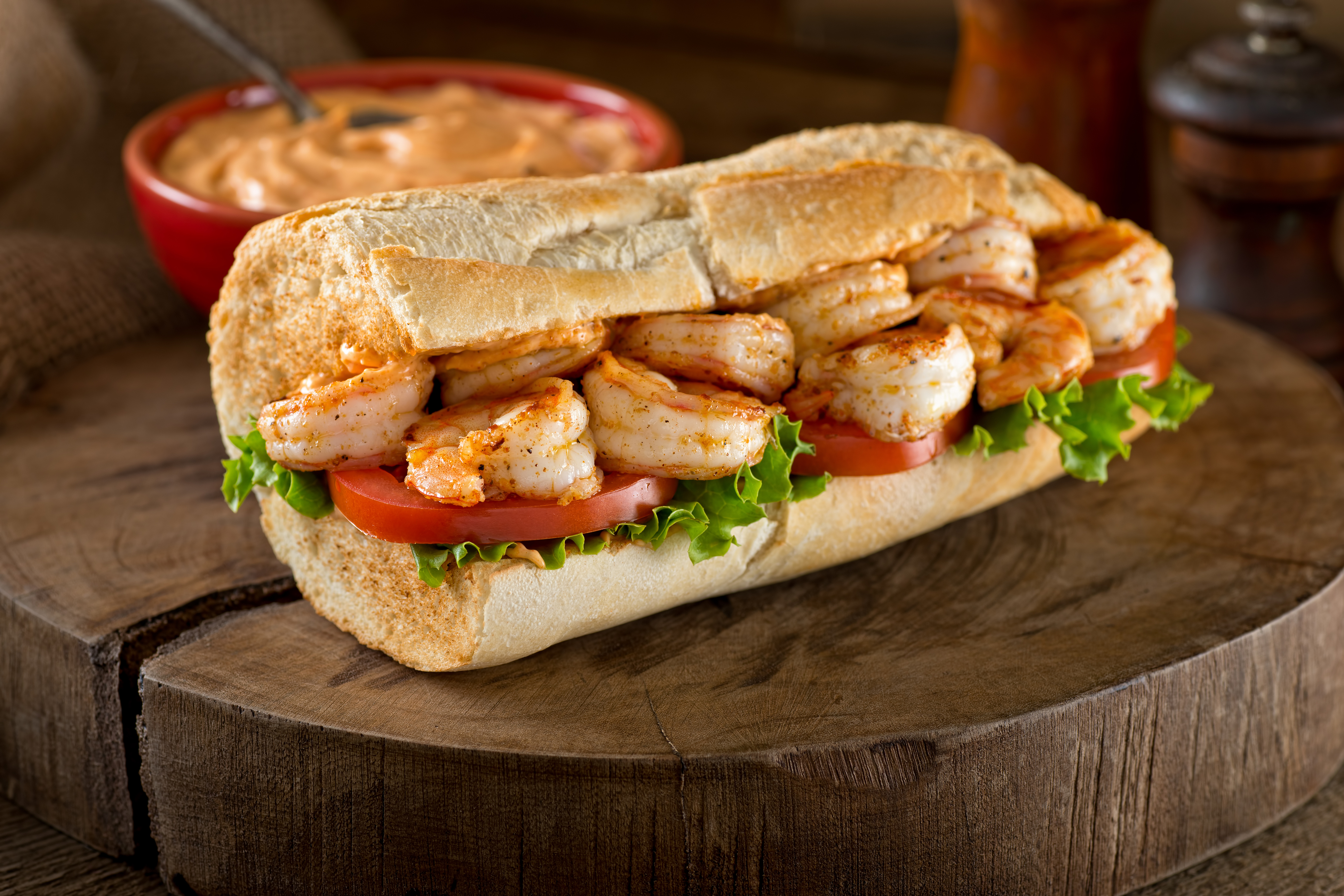 A grilled shrimp Po' Boy sandwich.