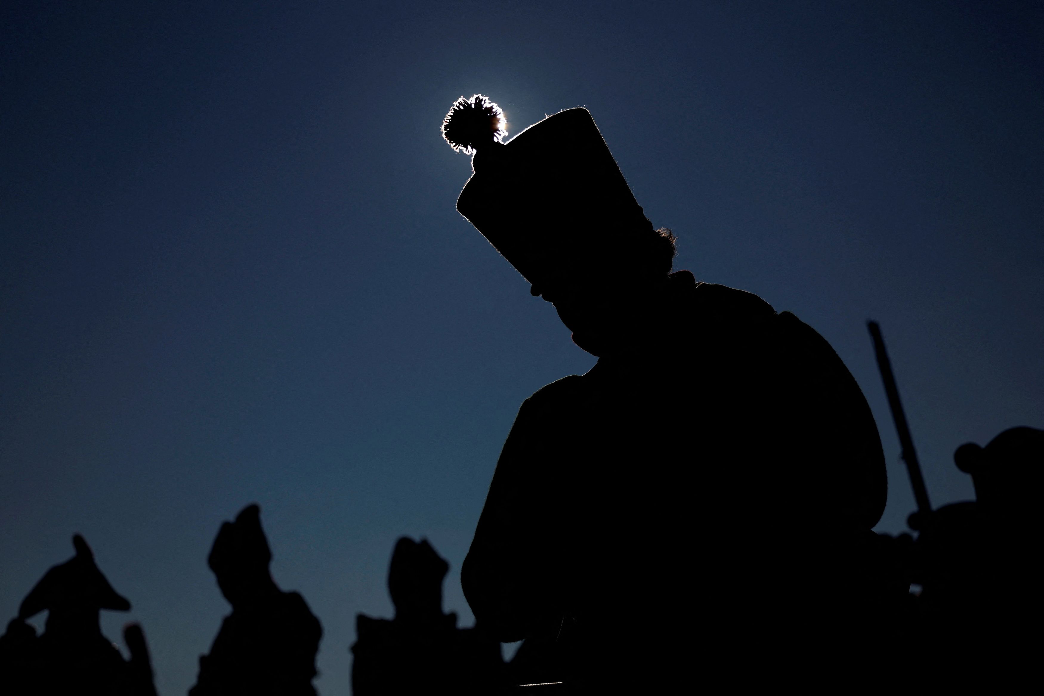 People dressed as soldiers march near the town of Slavkov u Brna
