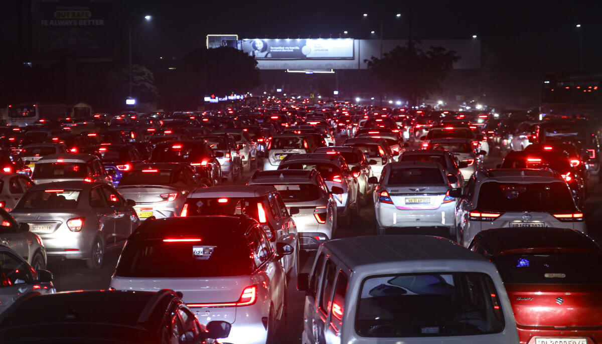 Vehicle stuck in a traffic jam on a highway, in Gautam Buddh Nagar
