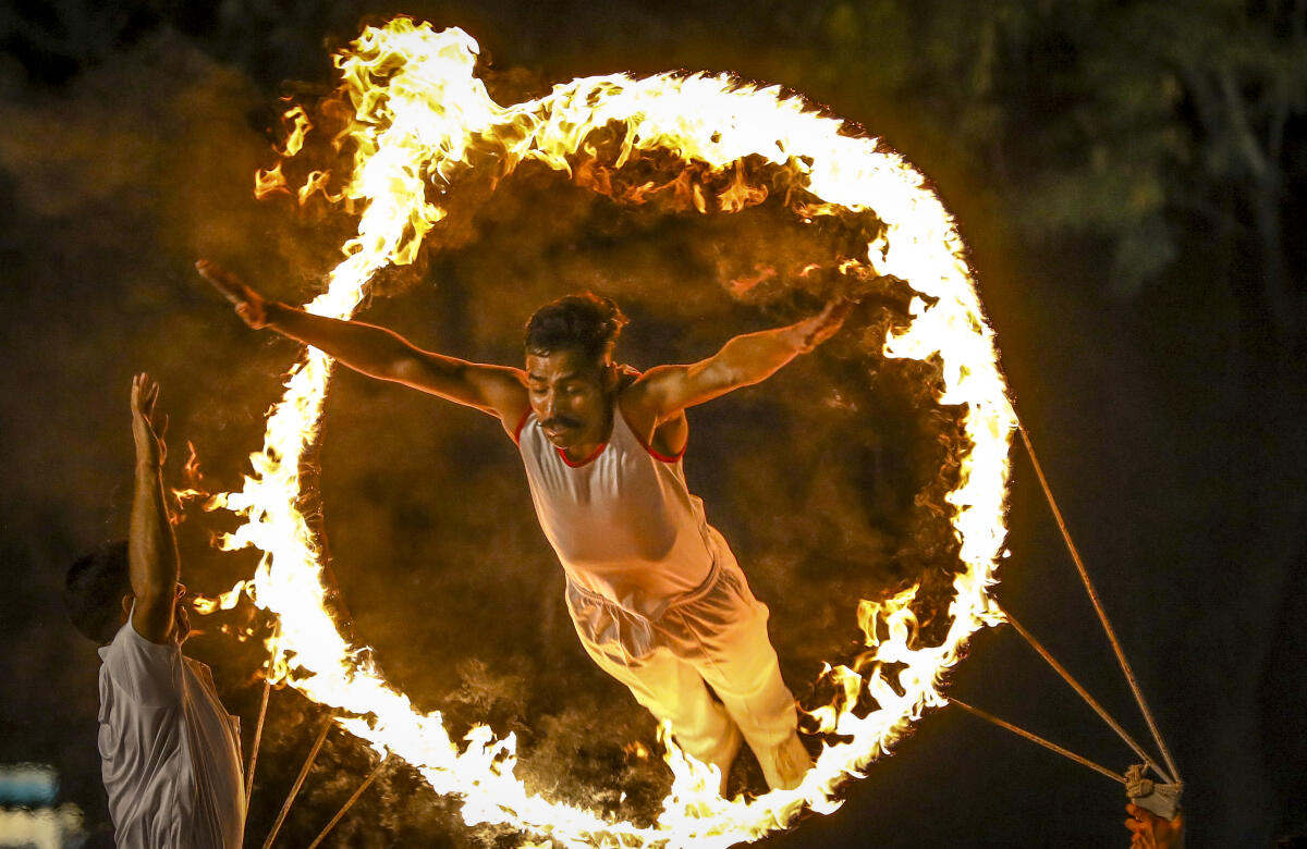 An agniveer demonstrates combat readiness and physical training during a spectacle at the Artillery Centre, in Hyderabad
