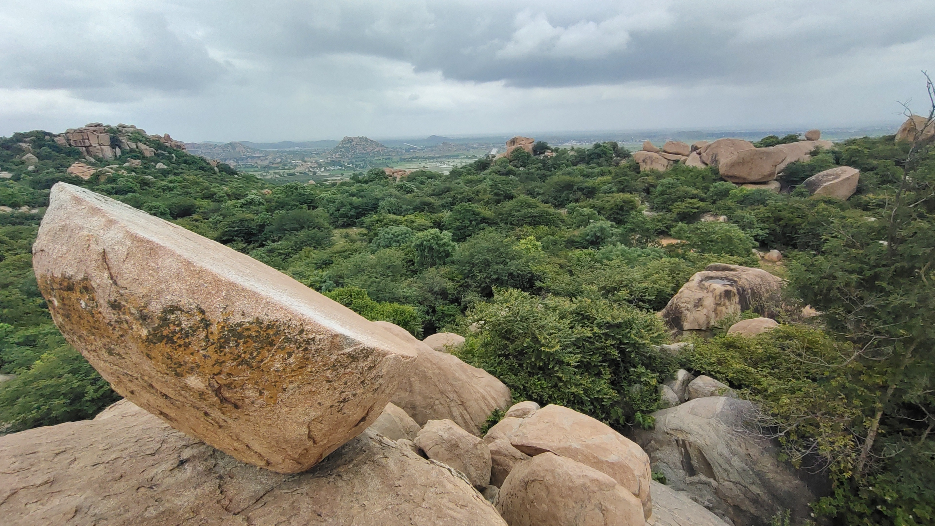 A stone kettle drum locally known as Nagaari Gund overlooking the megaliths at Hire Benakal. Photo by author