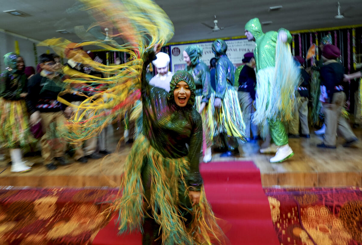 Colombian dance delegation members perform during the 12th Amritsar International Folk Festival, in Amritsar