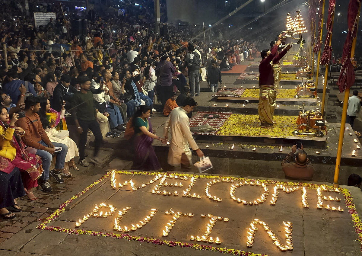 'Diyas' used to write a welcome message for Russian President Vladimir Putin amid his visit to India, during 'Ganga Aarti' at Dashashwamedh Ghat, in Varanasi