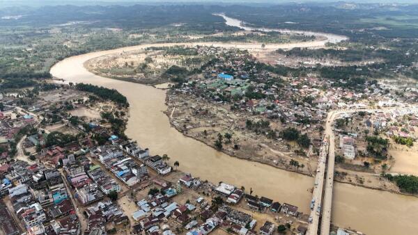 A drone view of an area affected by a deadly flash flood following heavy rains in Kuala Simpang, Aceh Tamiang regency.