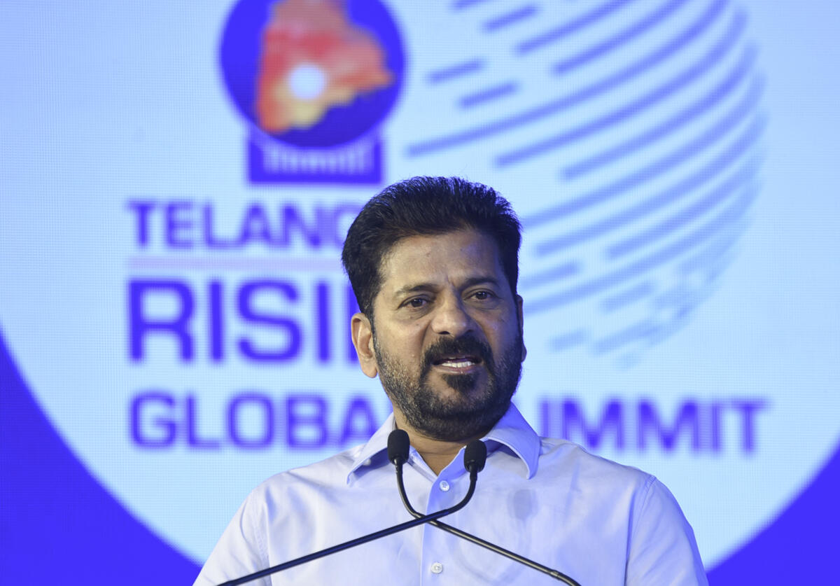 Telangana Chief Minister Revanth Reddy addresses the gathering during the Telangana Rising Global Summit 2025, in Hyderabad. Credit: PTI