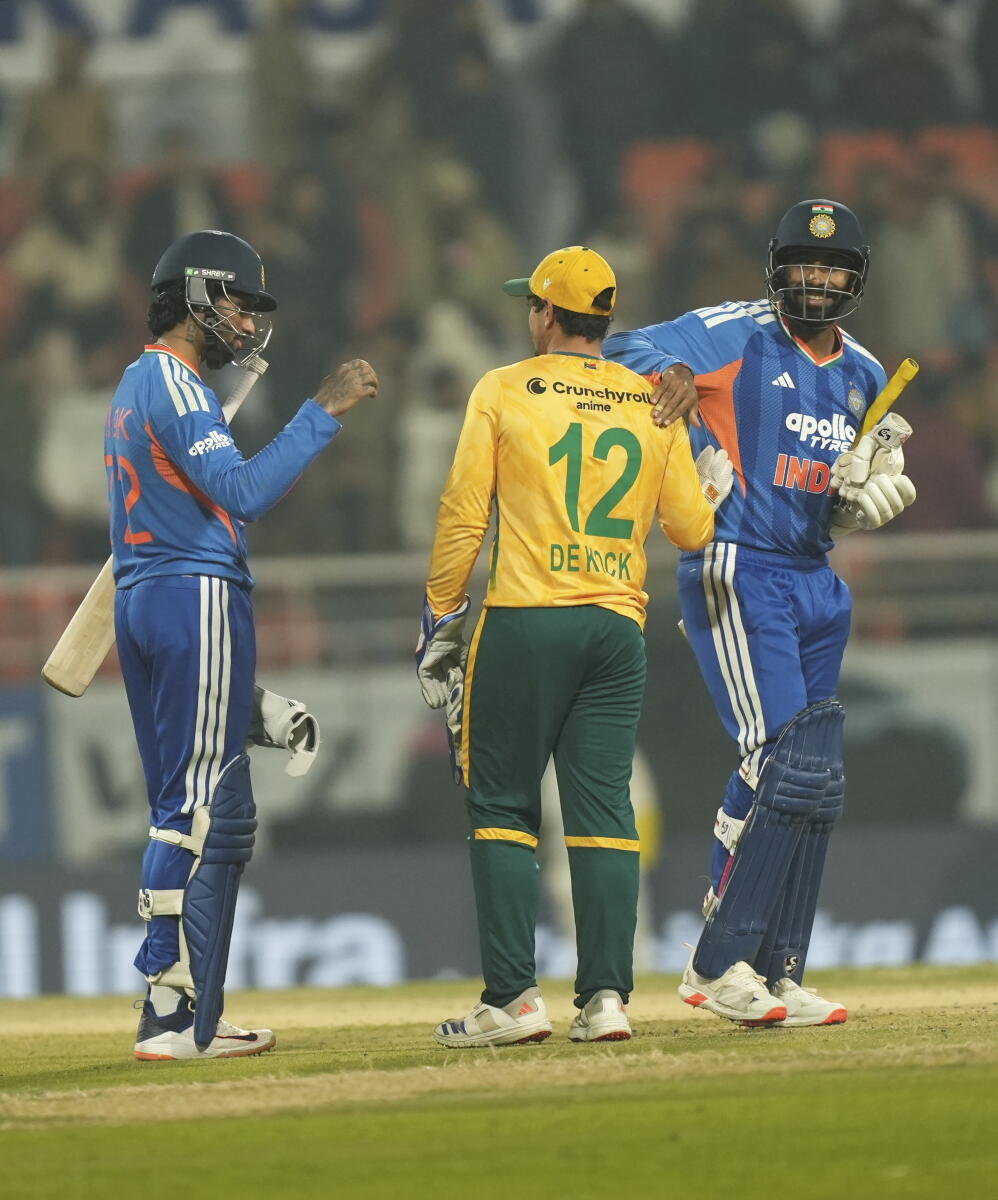 India's Jasprit Bumrah, left, and Tilak Varma, second left, congratulate South Africa’s players for winning the second T20 International cricket match, at Maharaja Yadavindra Singh International Cricket Stadium, in New Chandigarh Credit: PTI