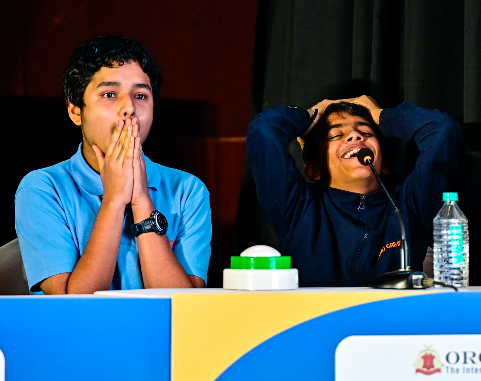 A mix of surprise and happiness when Trivikram and Vishnu win the tie breaker round in Prajavani quiz competition.
