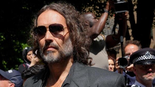 UK police say comedian Russell Brand charged with two more sex offences
