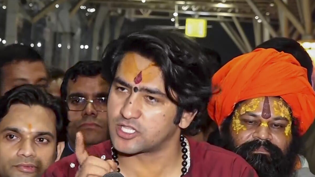 Video of Dhirendra Shastri arriving in Raipur in govt aircraft, cop touching his feet sparks row