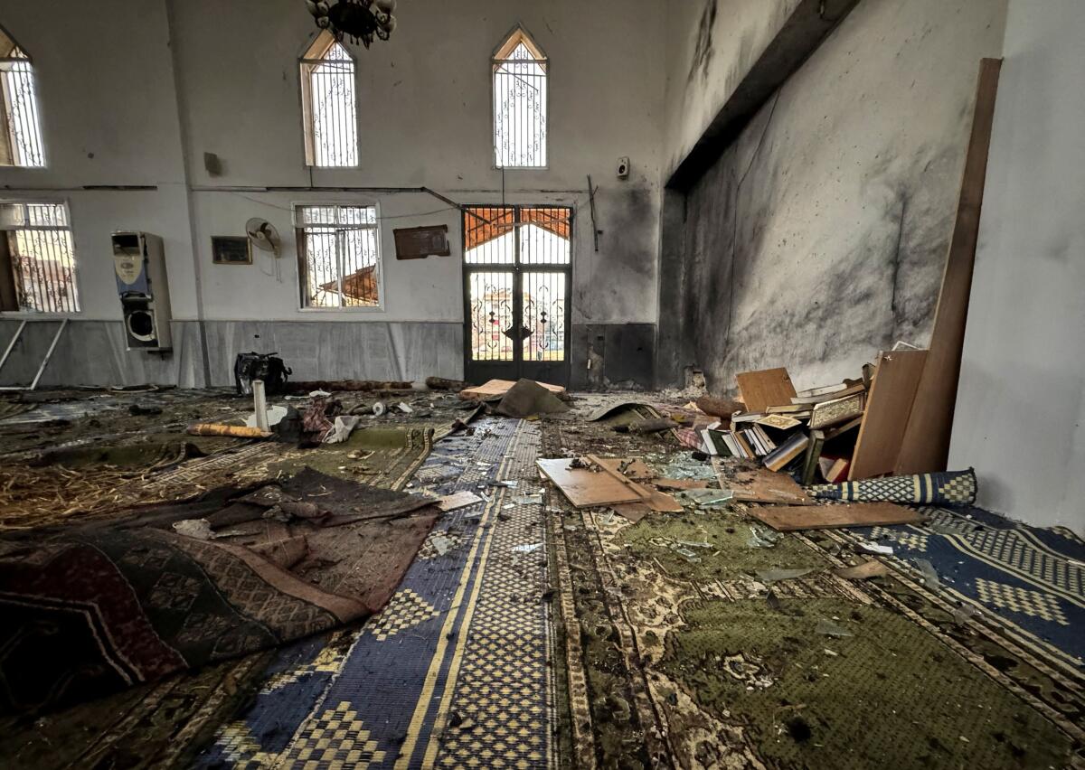 A view shows an interior of a damaged mosque after several people were killed in an explosion at a mosque of the Alawite minority sect, as a Syrian Arab News Agency (SANA) said, in Homs, Syria.